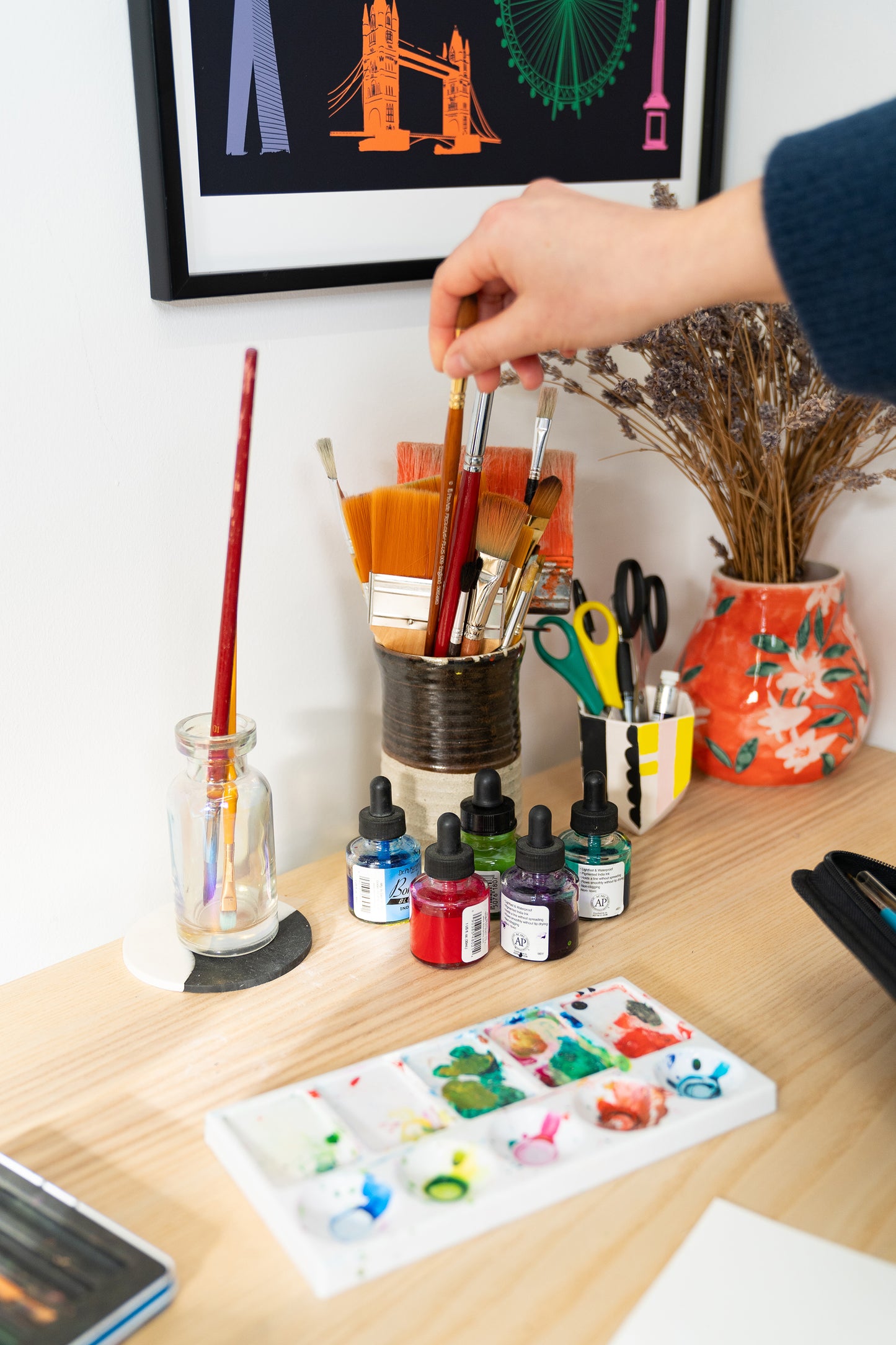 Art brushes and inks in London art studio