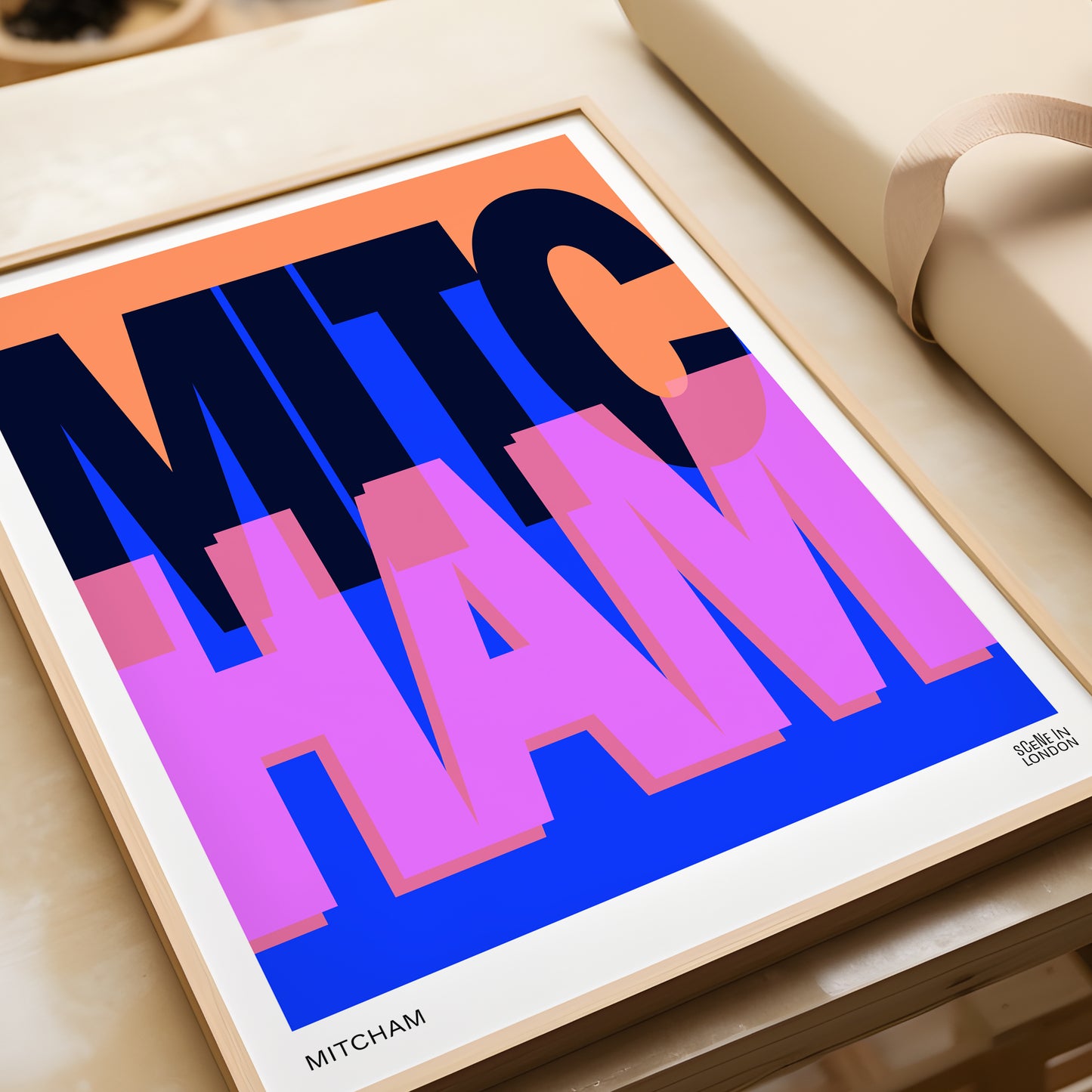 Framed London artwork with 'MITCHAM' in colourful letters