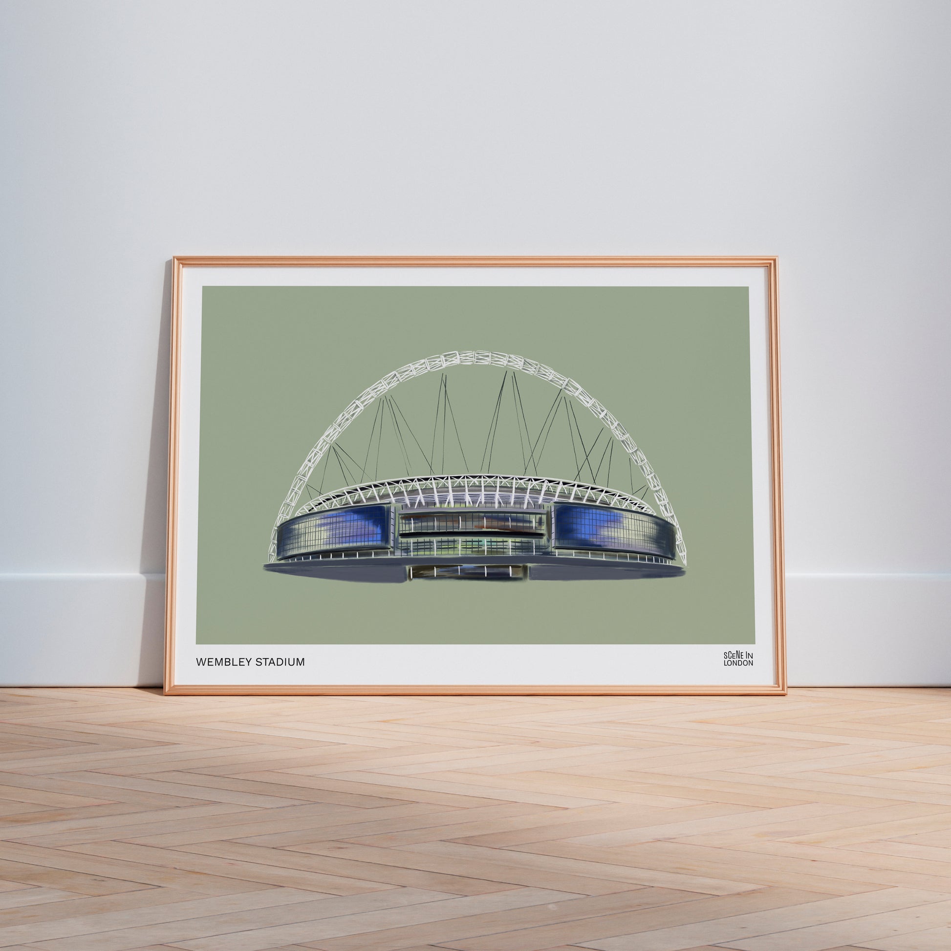 Framed artwork of Wembley Stadium on a light green background
